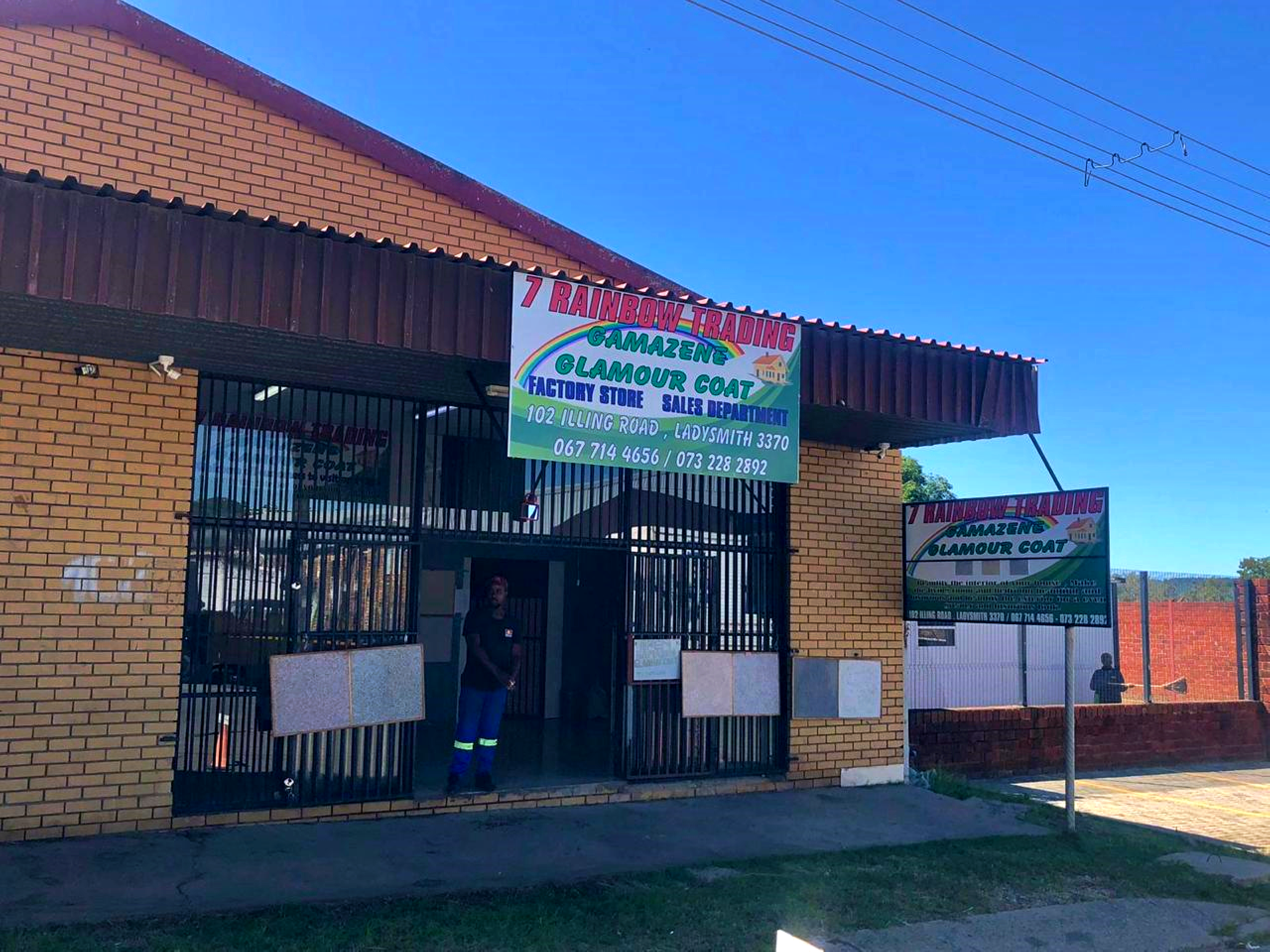 7 Rainbow Trading factory store and sales department at 102 Illing Road Ladysmith, a yellow brick building with signage showing Gamazene and Glamour Coat branding